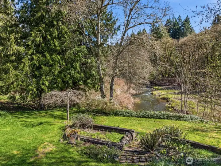 Stunning shaded & full sun Olequa Creek frontage!