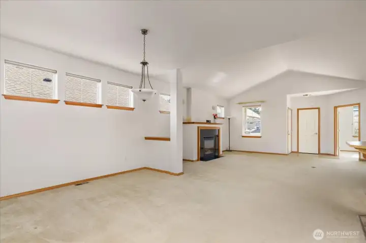 Vaulted ceilings make home feel even more spacious.