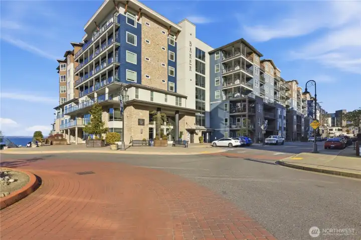 Exterior view of the Baker Building, situated within the highly sought-after Point Ruston community. Breathe the fresh sea air as you enjoy close proximity to scenic paths, outdoor recreation, shopping, dining and entertainment.