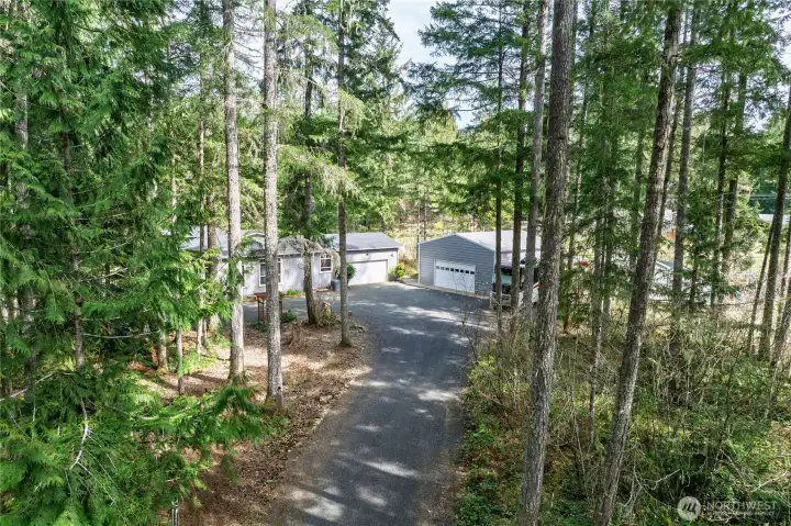 Aerial of above driveway up to house