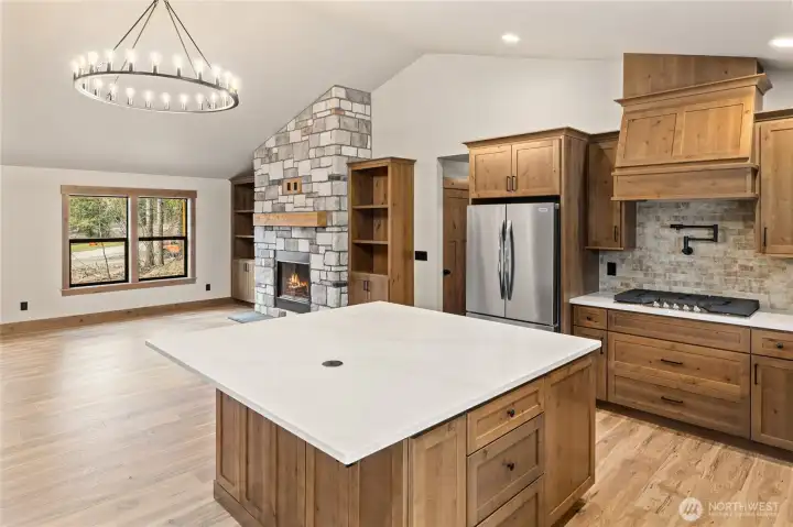 Open floor plan. Large kitchen island with quartz countertop
