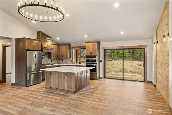 Kitchen table space on the right with direct access to outdoor rear patio