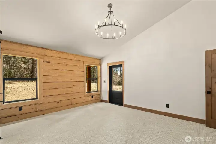 Master bedroom w/ custom milled cedar accent wall