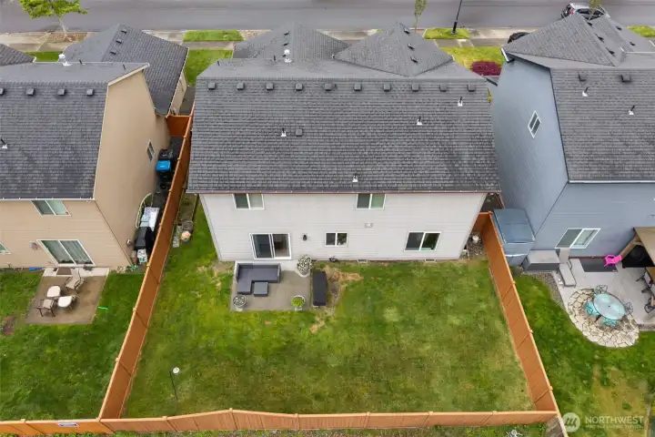 Fully fenced, low maintenance lot with irrigation system and AC!