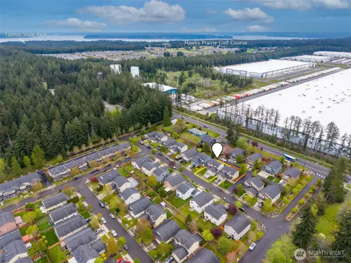 Central Hawks Prairie location - walking distance to corner store, 5 minutes to Tolmie State Park, short drive to restaurants, pickleball, amenities.  Roughly 15 minutes to JBLM via I-5.