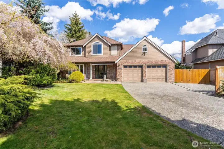 Located in a small cul-de-sac has it all! Welcome home! RV parking both in front of the side gate, at right and behind the gate.
