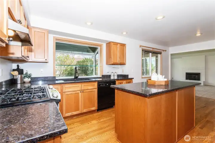 Updated kitchen with lovely quartz counters, quiet close drawers & cabinets