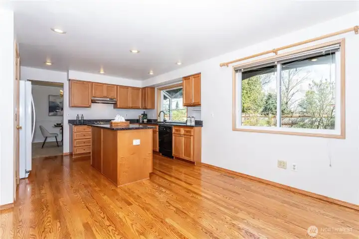 Room for eat-in dining table, window overlooks the rear patio & garden/lawn