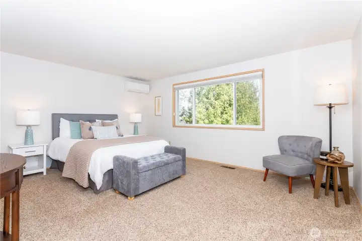 Spacious primary bedroom with 5 piece ensuite