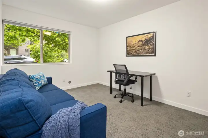 Large den on main perfect for guests, WFH, aging in place option.