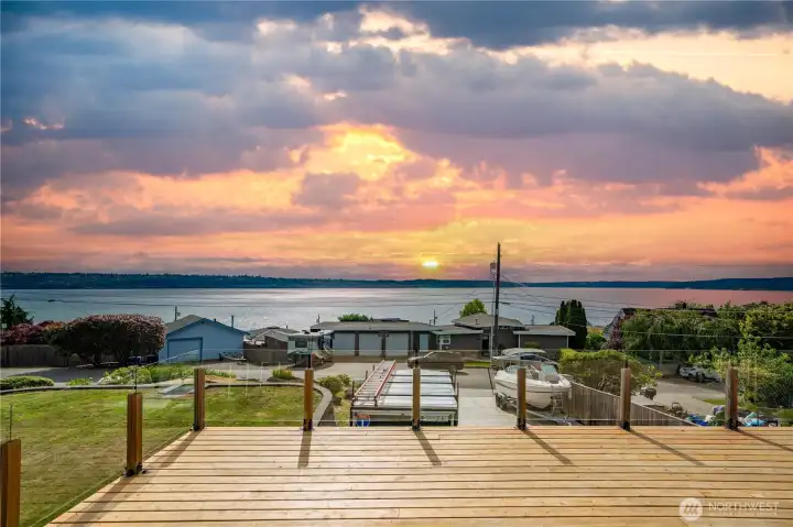 The expansive deck offers unobstructed views of the Puget Sound, imagine eating dinner out here, or watching the sunset, entertaining friends & watching the 4th of July fireworks display from the comfort of your own home!