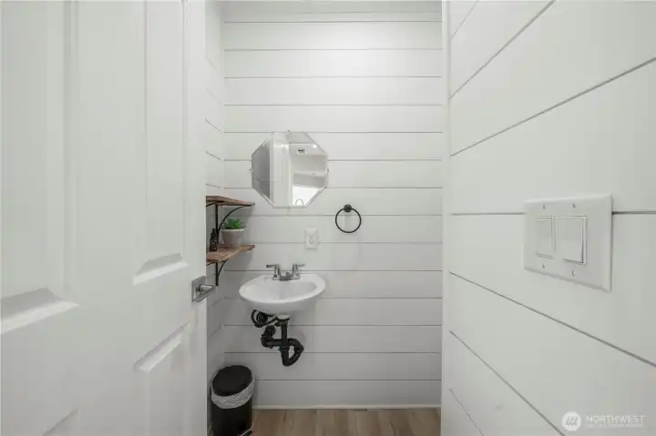 Upstairs 1/2 bath is super cute, just right for guests!
