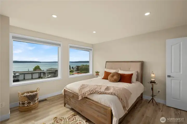 This suite is designed for comfort and convenience, with multiple closets, its own bathroom, and a gorgeous deck.