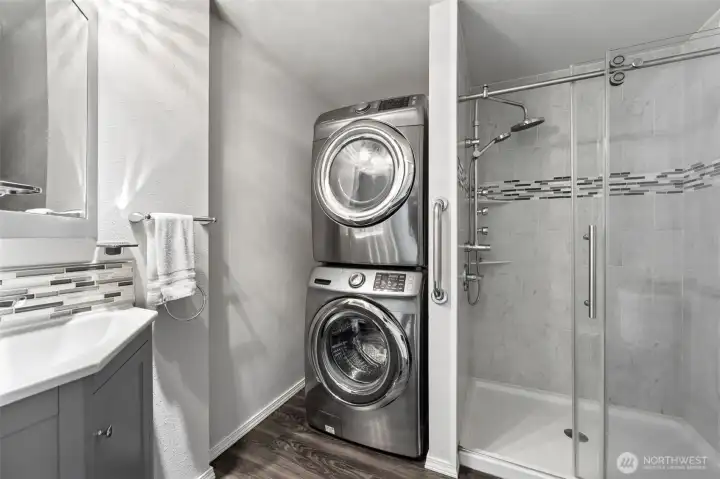 3/4 bathroom with stackable washer/dryer