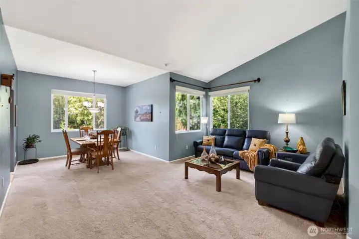 Formal dining right off the kitchen and adjacent to the formal living area perfect for hosting guests