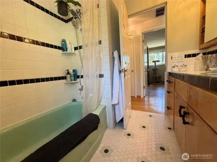 Lots of storage in the bathroom, including 4 corner shelves in the tub/shower. Lots of storage in the bathroom, including 4 corner shelves in the tub/shower.