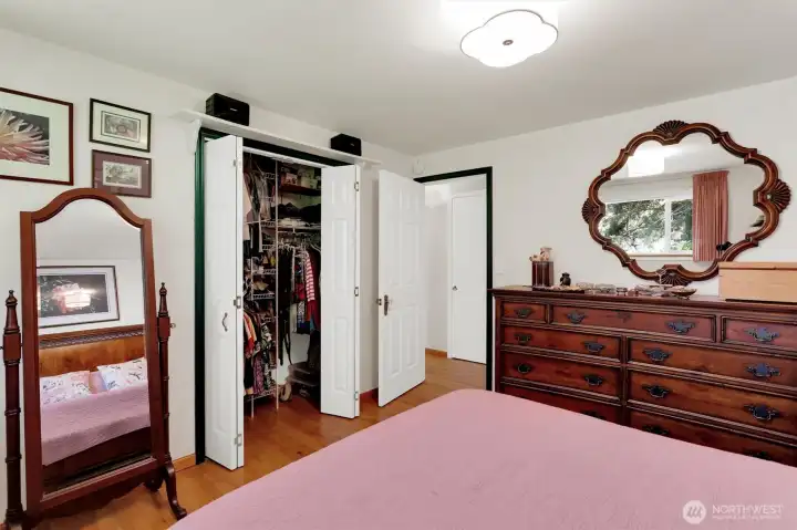 Closet has multiple height hanging rods, shelves and shoe rack. Closet has multiple height hanging rods, shelves and shoe rack.