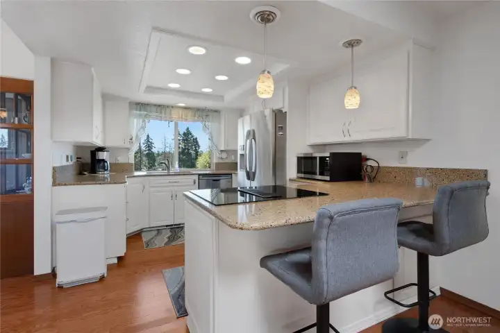 Kitchen is updated with granite counter tops.