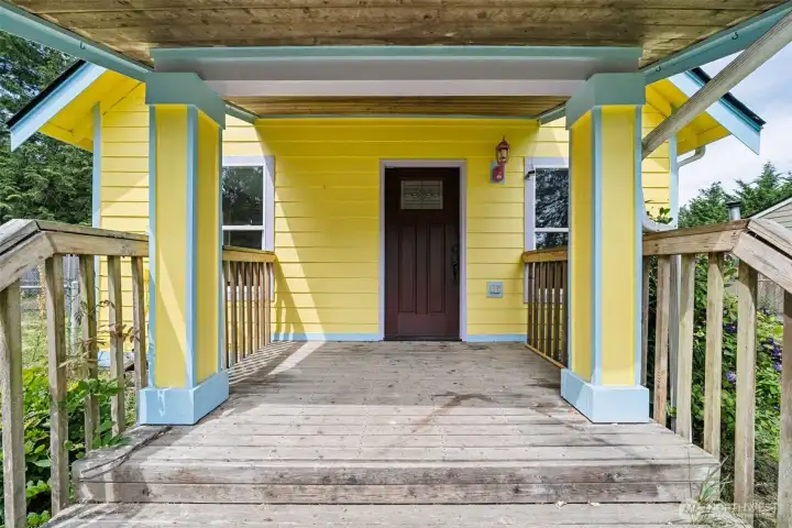 Enter through the covered front porch.