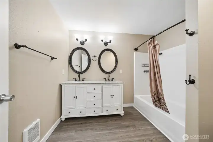 Bathroom with dual sink vanity.