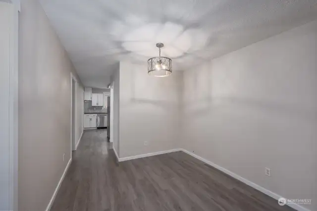 Shop house dining area to kitchen/Bedrooms on the left/Laundry on the right in hallway