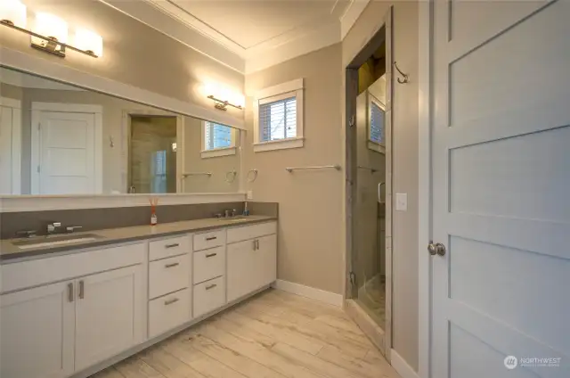 The primary bath has double vanities, a large walk in shower.....