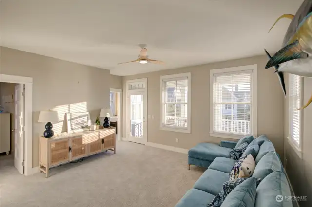 There is a door to the upper covered porch which offers the very best views!  There are also two guest suites and 2 baths on this level.