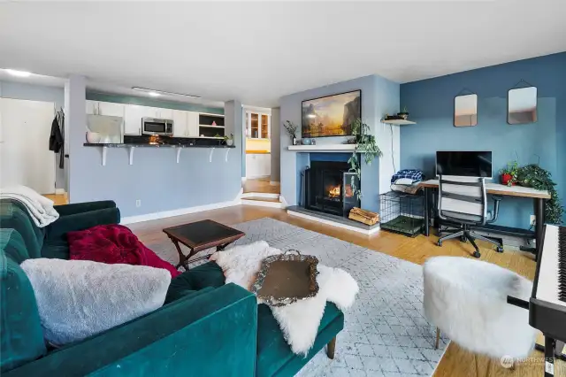 Kitchen overlooks living room.