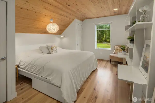 All 3 upstairs bedrooms with Heart Pine Floors & Ceilings