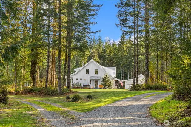 The home sits well off the private road, just around the bend in the driveway ~ welcome home!