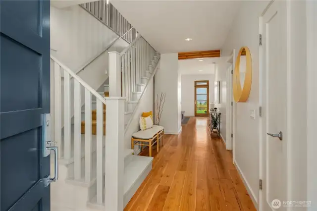 Welcoming entrance showcasing the gorgeous Reclaimed Fir Floors salvaged from an Oregon Nike Warehouse