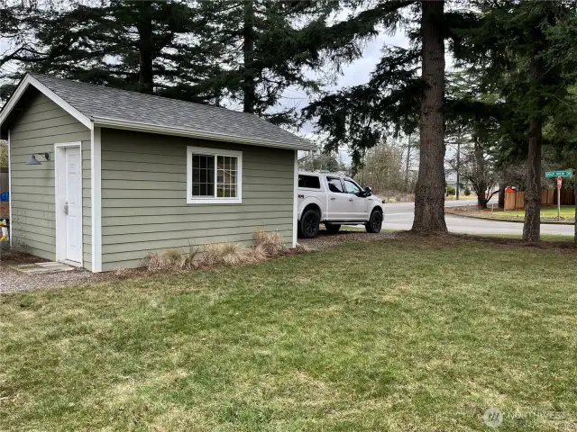 The house, yard, fence, carport, and 1-car garage all complement each other with a cohesive country style, creating a charming and inviting appeal throughout the property.