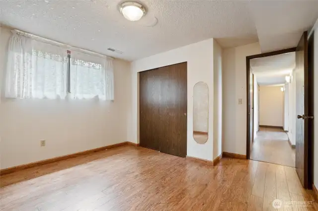 A second bedroom on the lower level is light and bright, even downstairs.