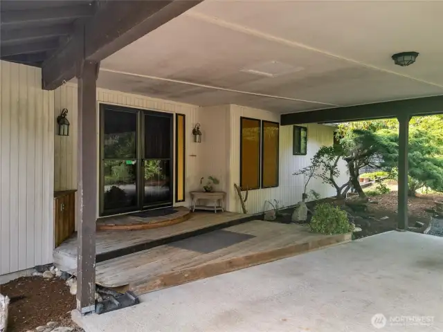 Drive right up to the front door and unload supplies.  A 2-car carport has ample room to keep vehicles under cover.