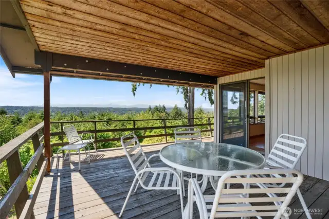 A covered deck is a great place to entertain year-round and is an excellent place to watch the 4th of July fireworks over Henderson Bay.
