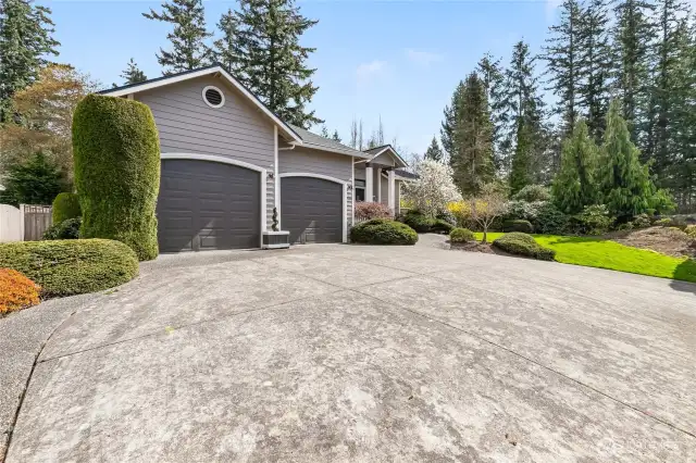 Beautiful mature landscaping all around the home