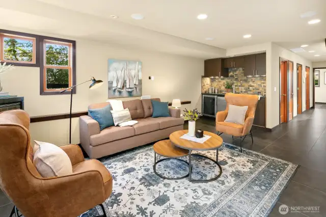 Lower living area features a wet bar and gas heater.