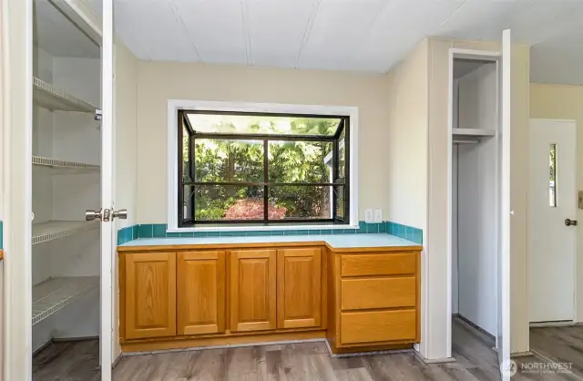 Good sized pantry and utility closet