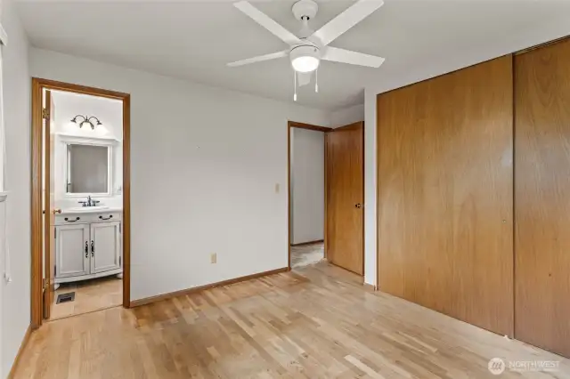 Primary bedroom and 1/2 bath