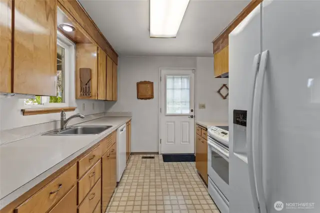 Galley kitchen w/ pass through window
