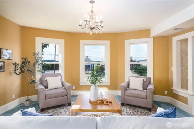 Formal living room is carpeted, but Seller says there are wood floors underneath. (as always, Buyer to verify.)