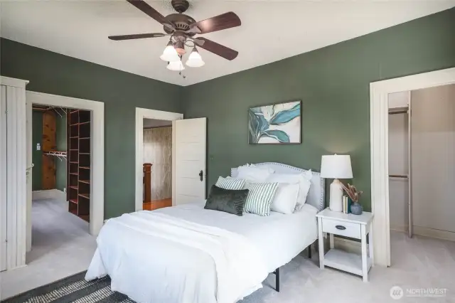 Another view of the primary bedroom with 2 spacious walk-in closets plus a built-in.