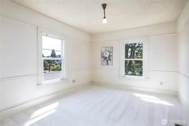 This beautiful and very spacious bedroom has southern and westerly exposure creating an inviting atmosphere.