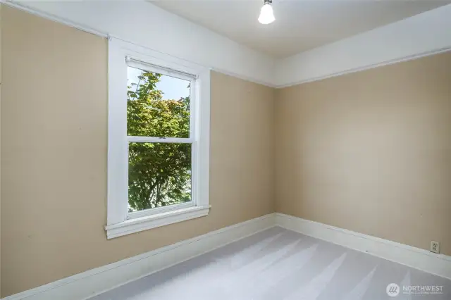 Third bedroom upstairs with Easterly exposure.