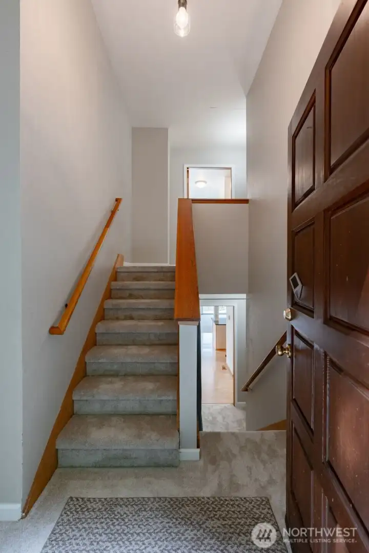 Entering from the back you can access both the upstairs and downs stairs. Both offering the same floor plan complete with 2 bathrooms, 2 bedrooms, laundry and kitchen.