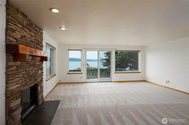 The lower level has a full wall of windows as well
