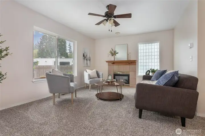 Brand new carpet throughout home & fresh paint. Cozy gas fireplace w/tile surround