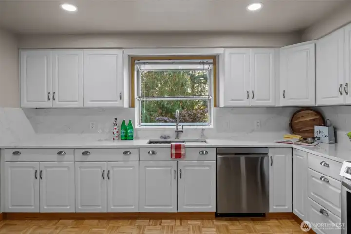 Kitchen with New White Quartz Counter Top and Full Back Splash and Stainless Steel Appliances