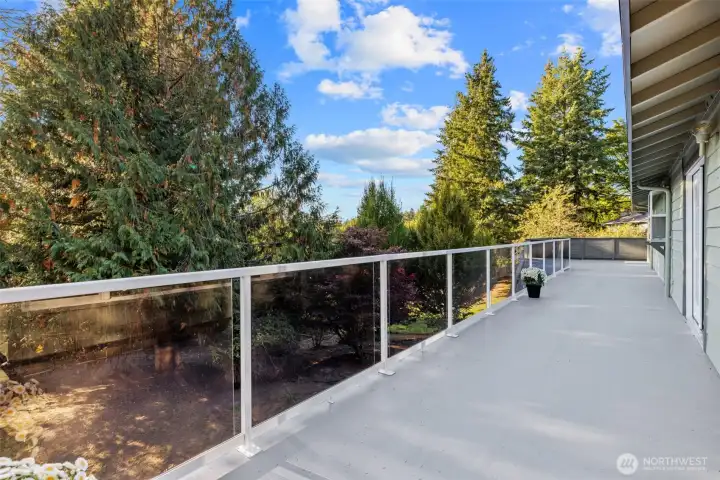 Deck Right runs the width of the house. Frech door access at each end of Deck. With stair access to back yard