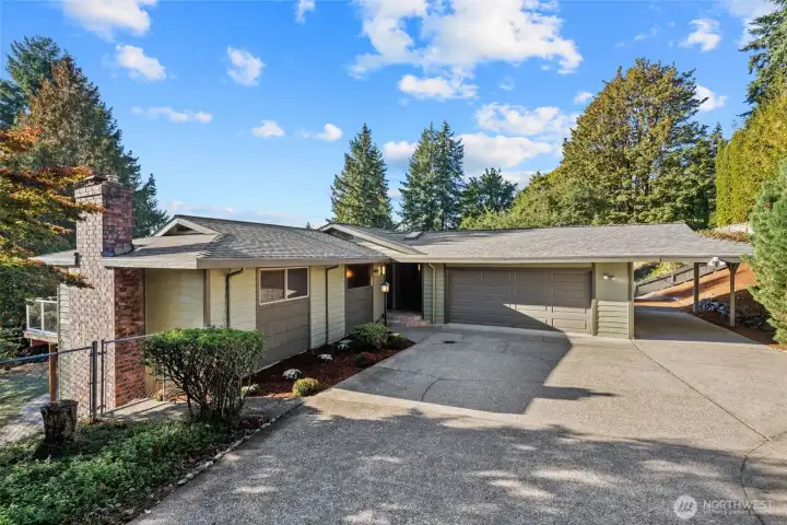 Front view of  extra deep Gararge and Deep Carport Parking